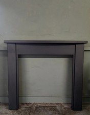 A Beautiful Wooden  Charcoal Black Fireplace Mantle Surround