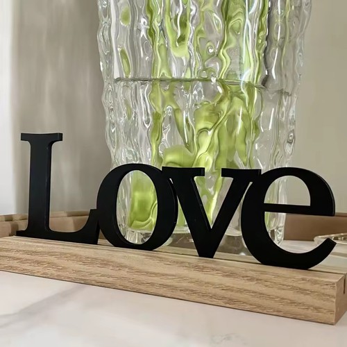 Love wooden word home - love,
