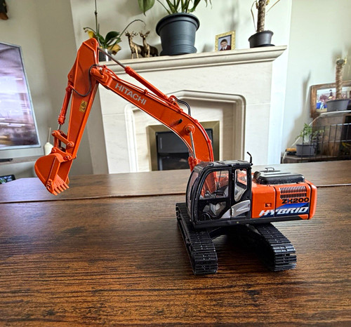 Hitachi hybrid tracked - hitachi,