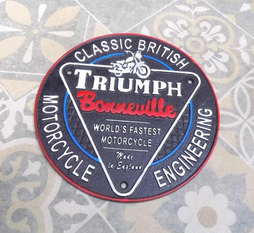 Heavy cast iron sign - heavy, triumph