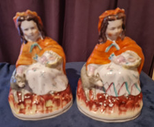 A Pair of Staffordshire Antique figurine Woman and her dog