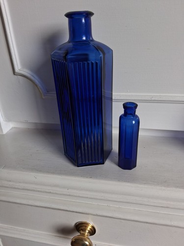 Blue glass poison bottles - 2,