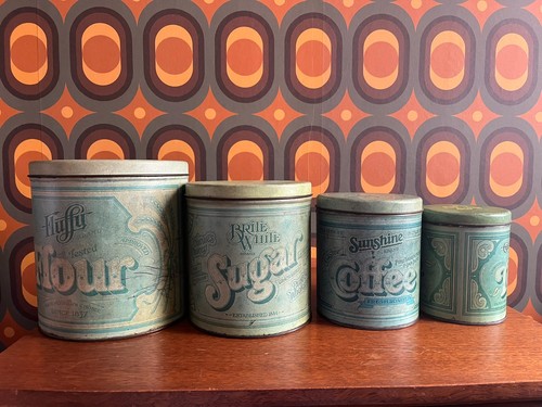 Four vintage ballonoff tin - vintage,
