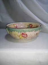 Elsie ware floral bowl and strainer.