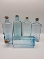 5 Vintage Embossed Bottles