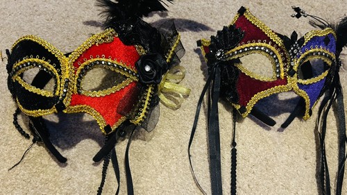 Pair masquerade masks - of,