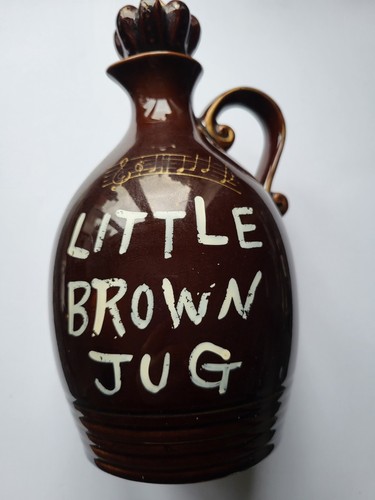 Very old little brown musical - brown,
