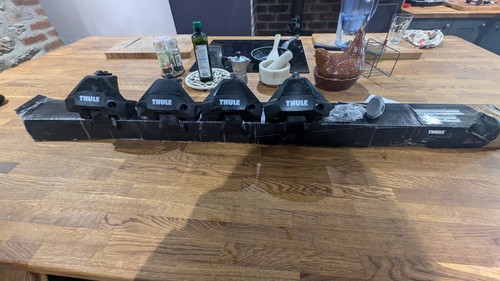 Thule roof bars 135cm - 135cm, and