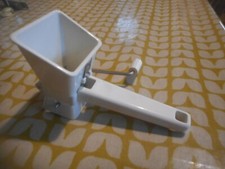 Old white plastic Mouli type
