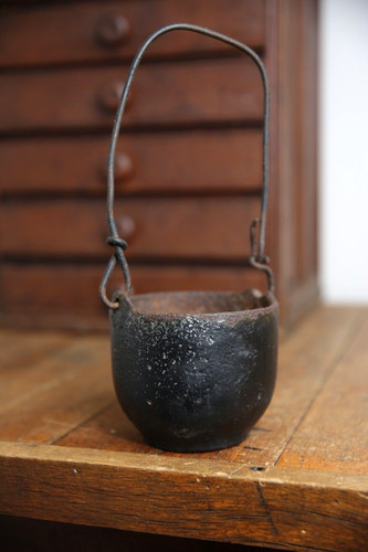 Vintage small cast iron witch - small,