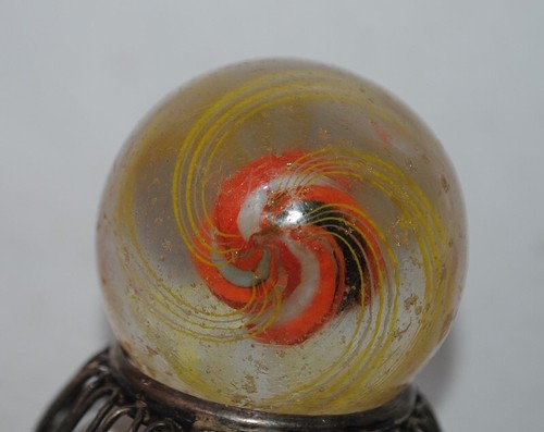 Old large glass marble with - large,