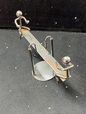 Vintage kinetic Seesaw toy