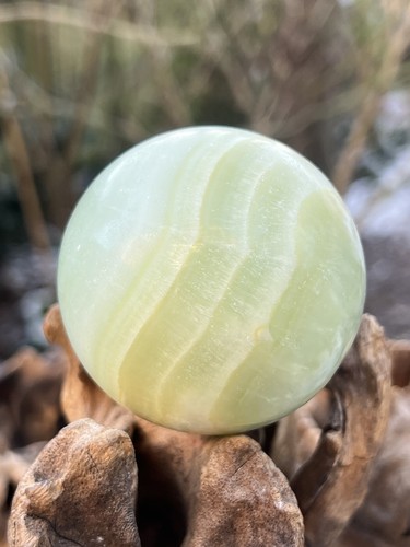 Pistachio calcite crystal ball - calcite,