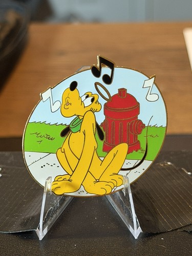 Disney auctions pluto fire - auctions,