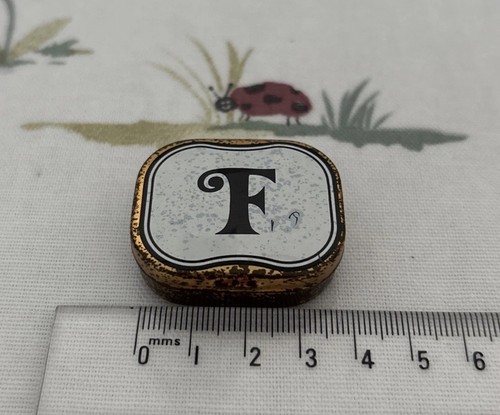 Small name initial - initial, f