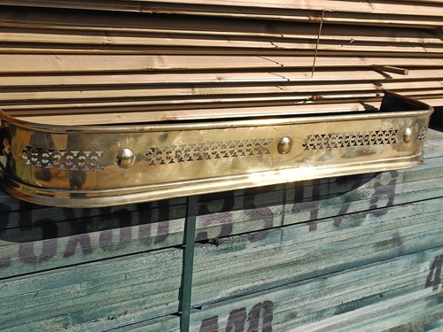 Brass fire surround