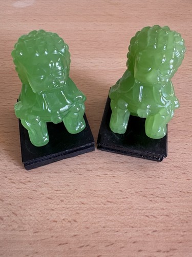 Pair green glass foo dogs - of,