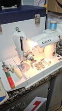 VINTAGE WHITE SINGER 221K IN