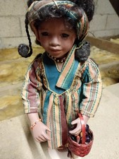 Porcelain doll from Ashton Drake Collection with basket of vegetables