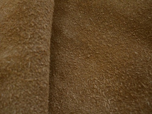 Thick tan brown rough suede