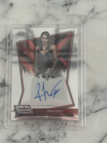 Rhea ripley red brand auto - rhea,