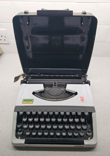 Brother 100 portable - 100, manual