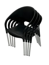 Black plastic stacking chairs