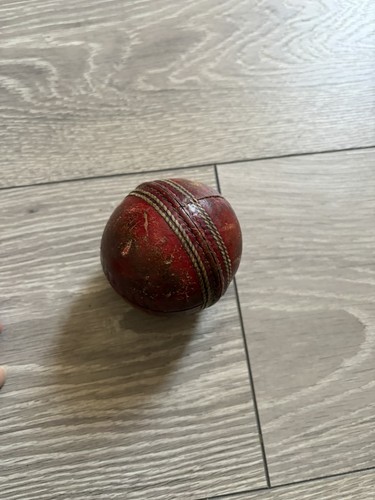 Used red leather cricket ball - red,
