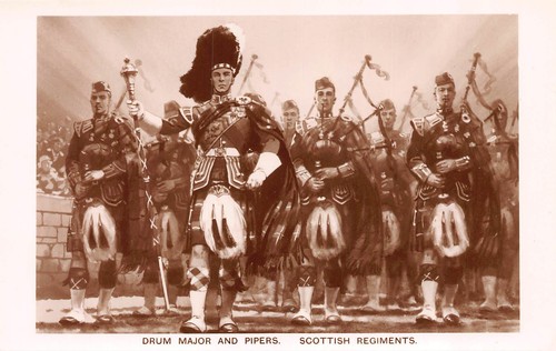 Drum major and pipes - and,