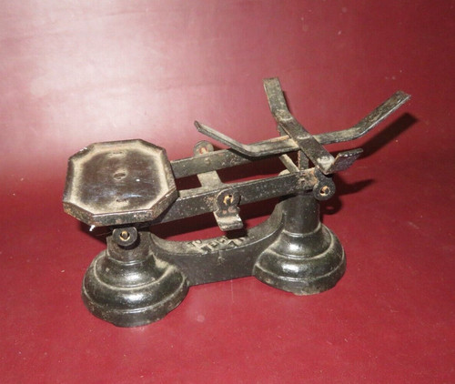 Antique cast iron merchant - antique,
