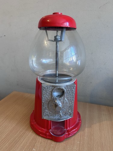 Coin operated gumball machine - coin,