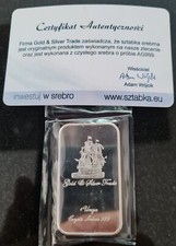 1 oz gold and silver trade Sealed Silver Sealed bar with Coa.