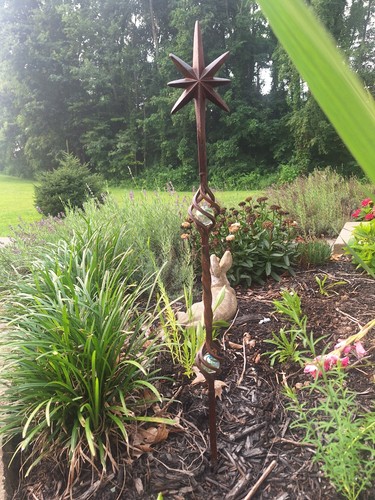Rusty metal garden stakes - rusty,