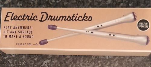 Electric drumsticks with - with, built