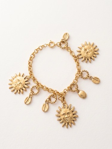 Vintage gold tone sun face - tone,