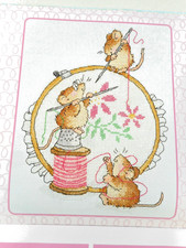CROSS STITCHING MICE. MARGARET