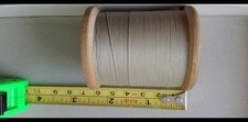Large vintage spool of beige