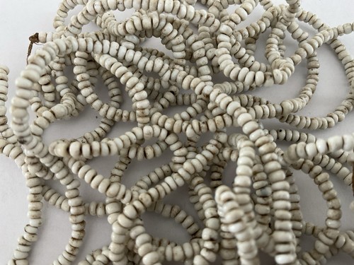 Old time white - time, beads.