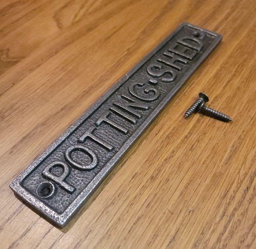 Cast iron wall mounted potting - cast,