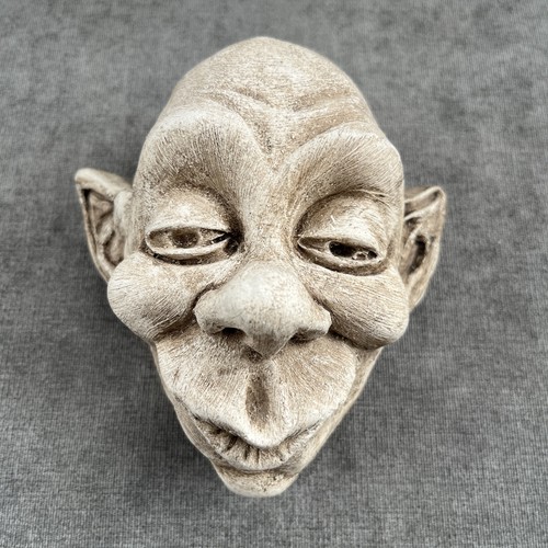 Stone face wall hanging - stone,
