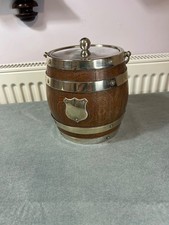 A vintage biscuit barrel with