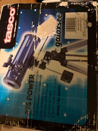 Tasco telescope and tri - , pod