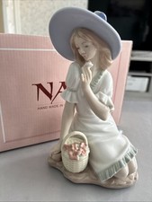 NAO by LLADRO Meadow Song #1365 Figurine of Girl sitting with Basket of Flowers