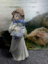 Nao by Lladro. We're Sleepy