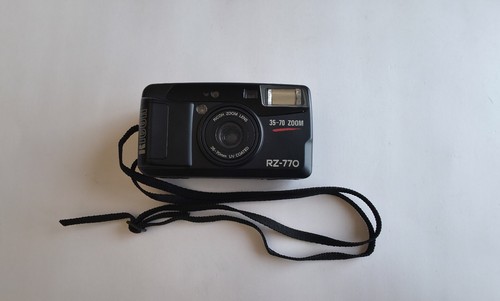 Ricoh 770 point shoot - &,
