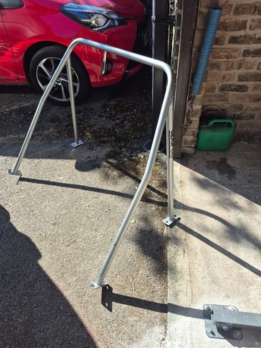Point roll cage for an - point,