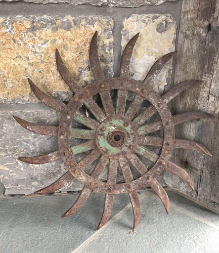 Antique rotary hoe wheels - rotary,