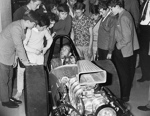 Young fans surround british - fans,