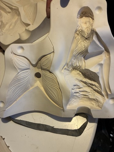 Slip cast mold - cast, sitting