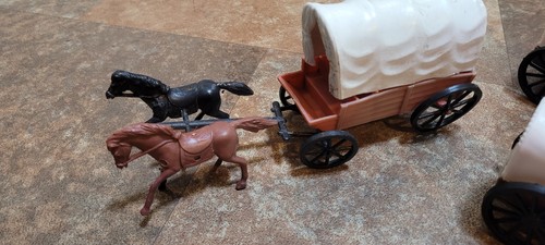 Covered wagons and plastic - wagons, toy